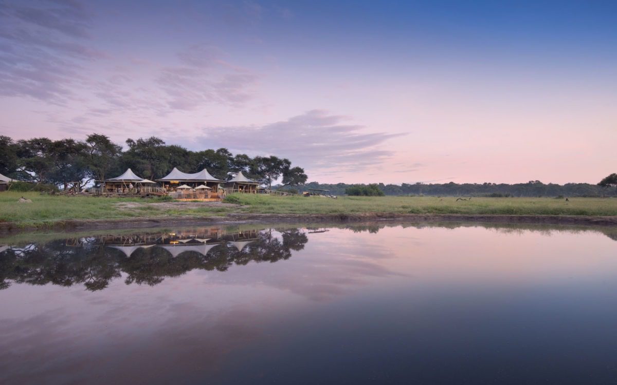 Somalisa-Camp-Hwange-National-Park-Zimbabwe-Luxury-Safari-Lodge-African-Bush-Camps-Camp-at-sundown-1200x750 copy